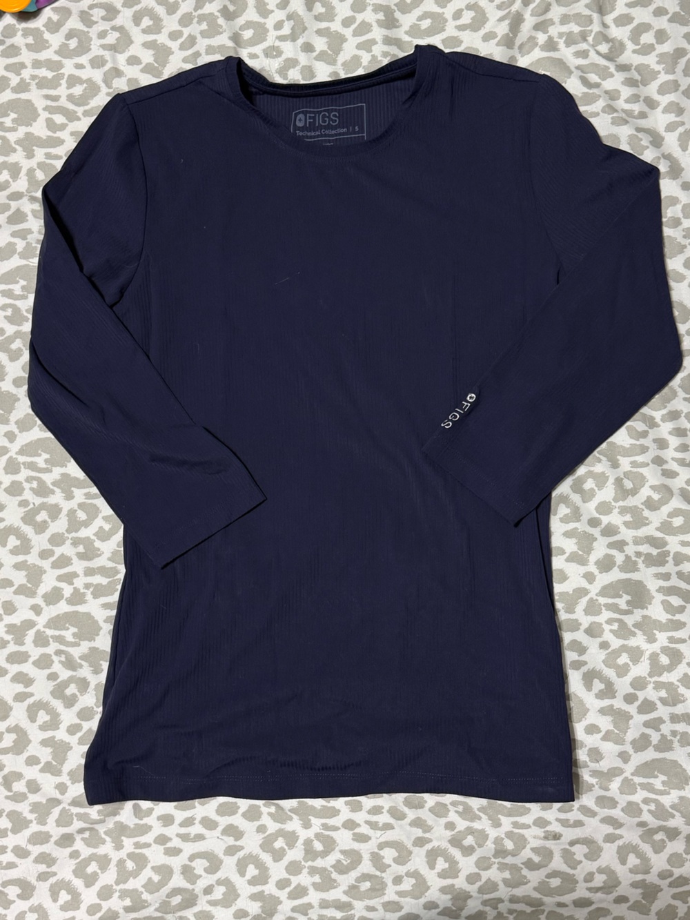 FIGS scrub top in Navy Blue